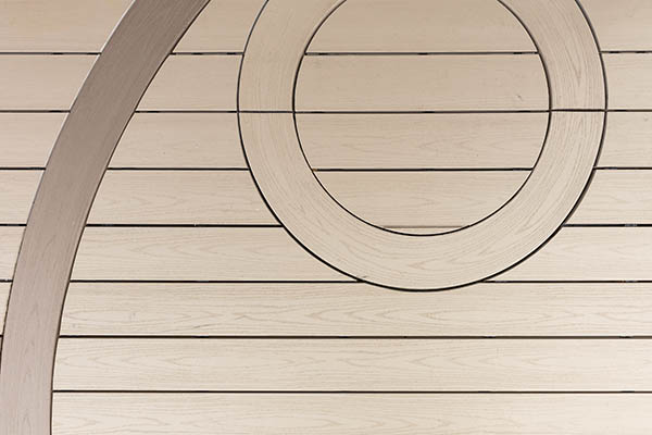 curved-composite-decking-TimberTech-AZEK-Harvest-Collection-Brownstone-small-circle-inlay